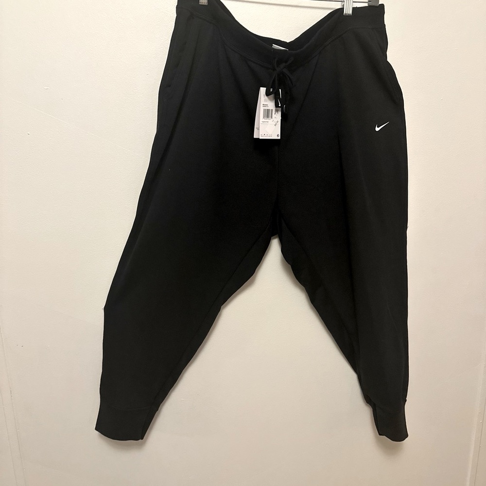 2 pairs Dri-Fit Plus size Nike Joggers.